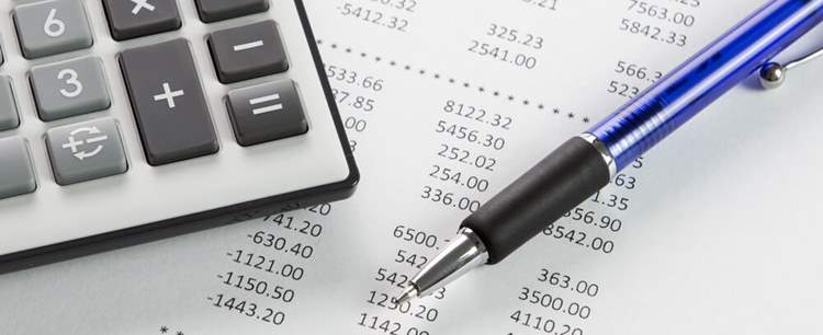 Paper and calculator showing how Maximising your profits as a buy to let landlord