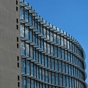 A view of a block of flats from the outside.