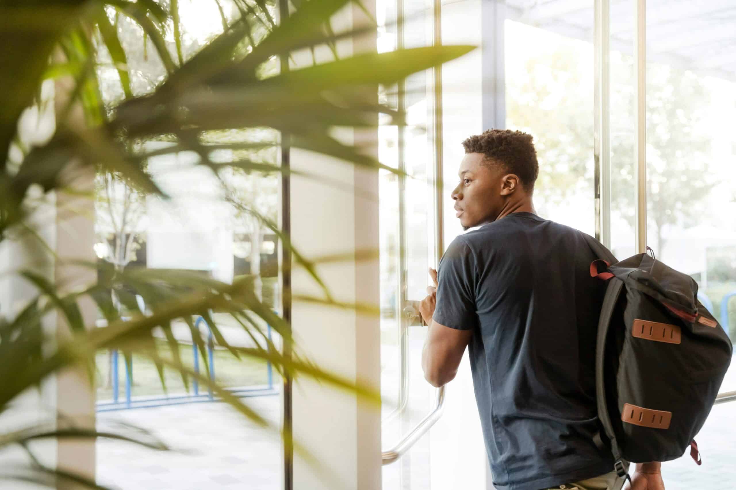 A student exiting a building